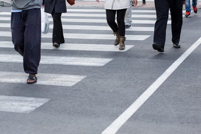 pedestrians crossing construction placeholder
