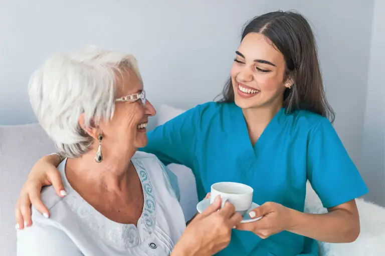 Home Care Leeds Carer serving Tea